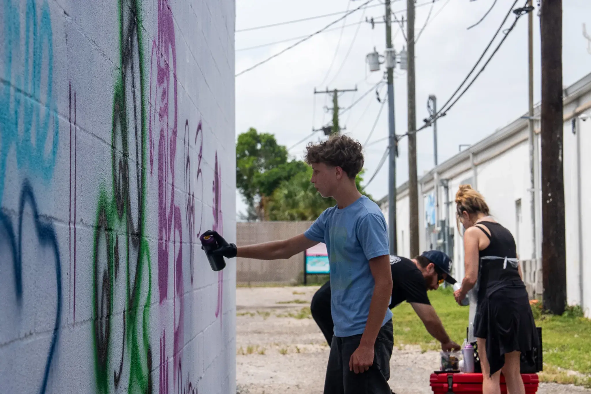 Spray paint class wall and guest artwork
