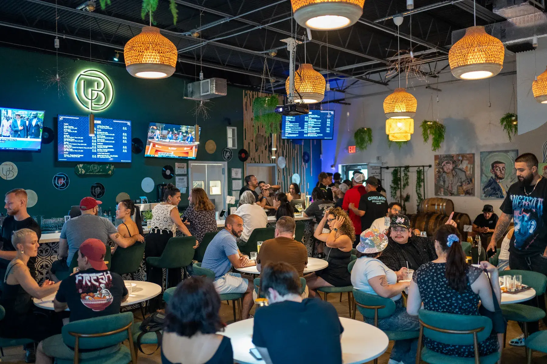 Packed indoor event with food and music at Thrive District