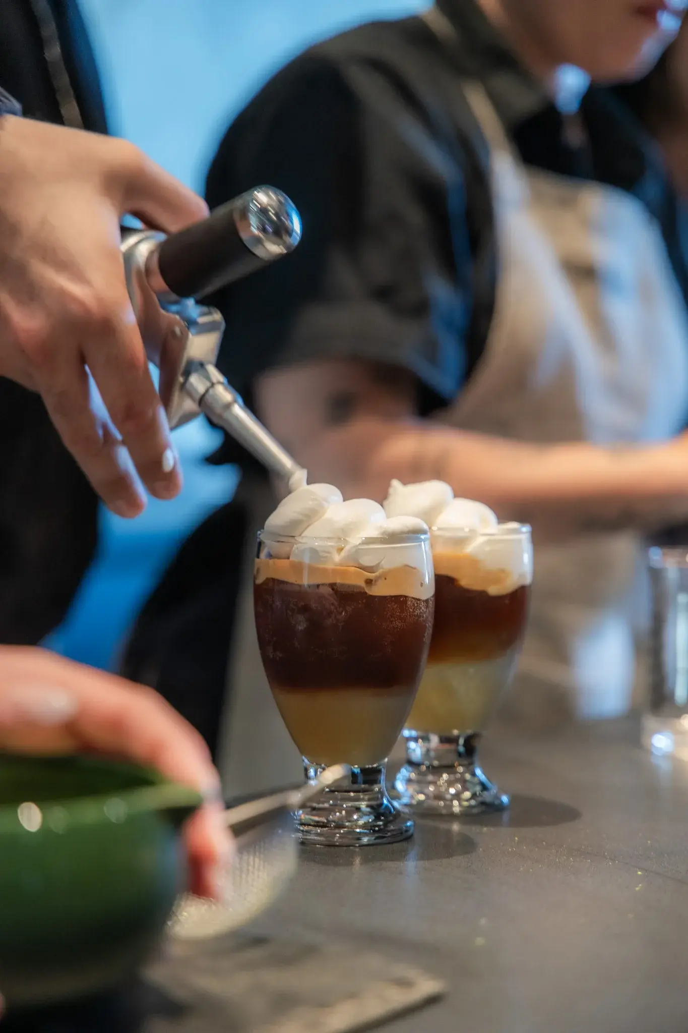 Alma Matcha drinks topped with whipped cream